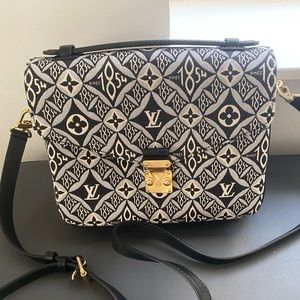 LV since 1854 pochette Métis